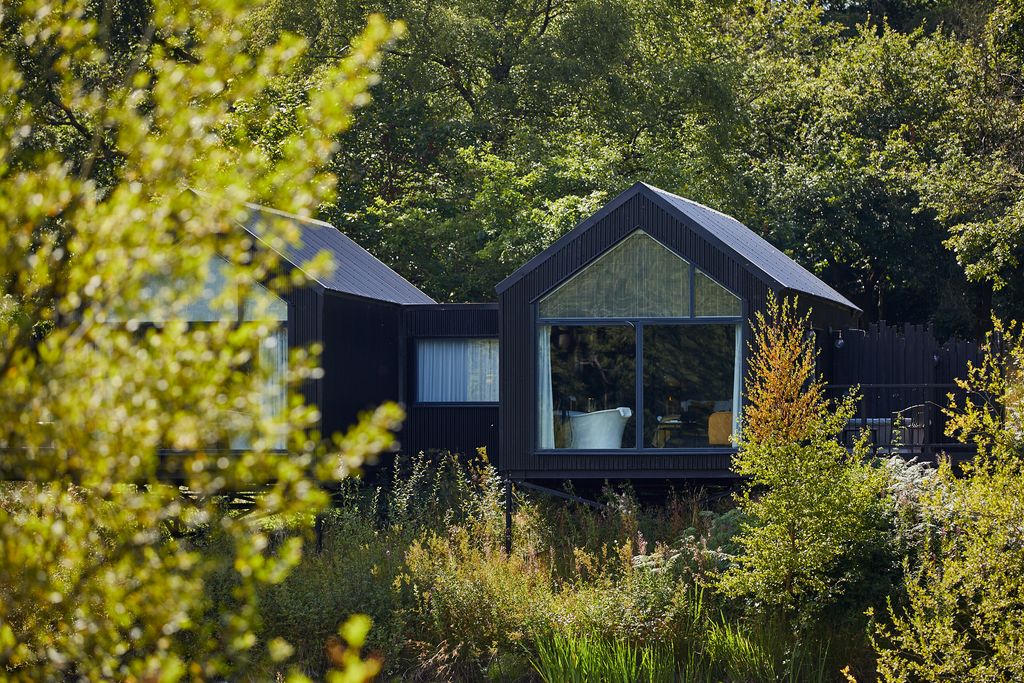 Image may contain Architecture Building Cottage House Housing Indoors Interior Design Outdoors Shelter and Cabin