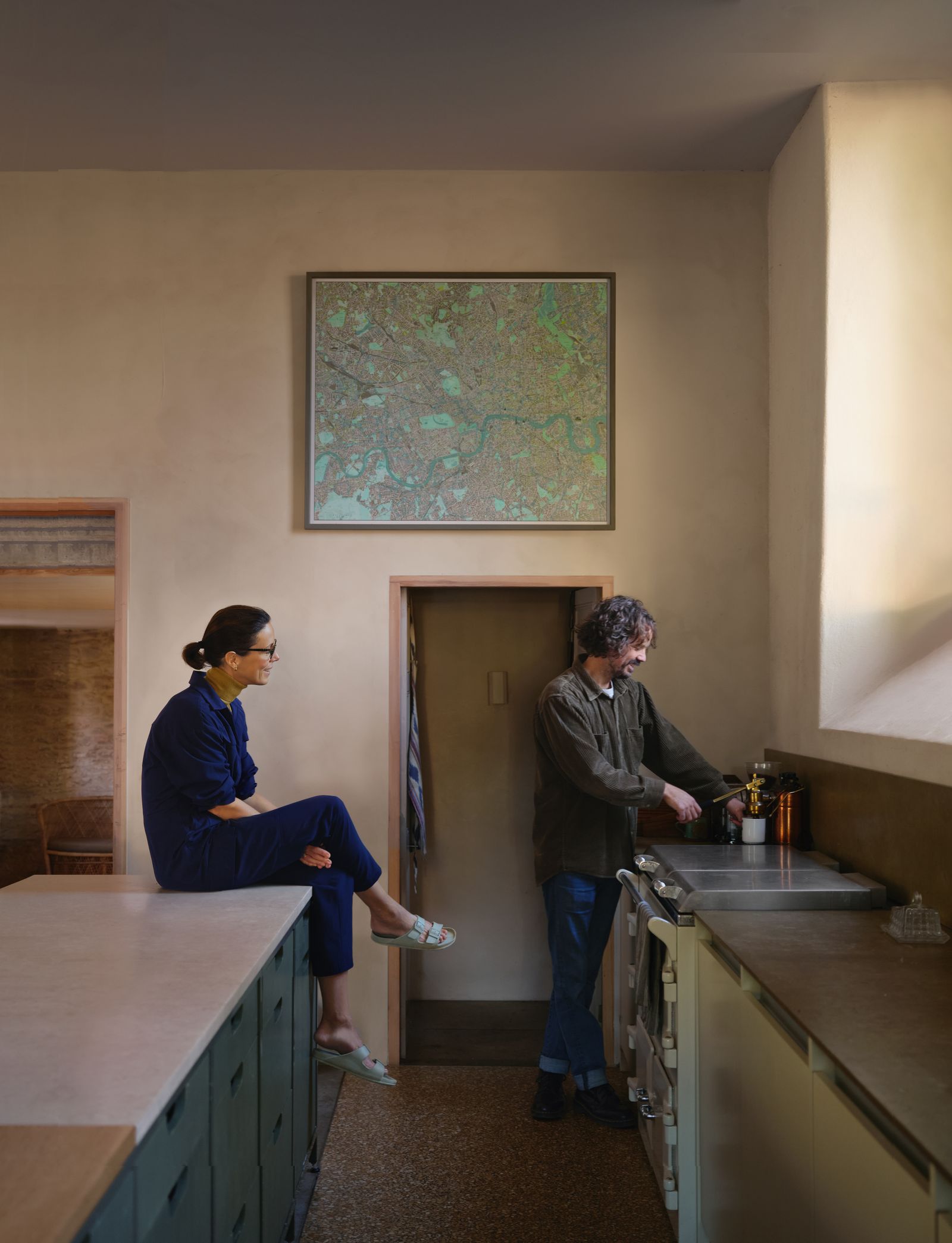 Image may contain Plywood Wood Clothing Pants Adult Person Footwear Shoe Indoors Interior Design and Chair