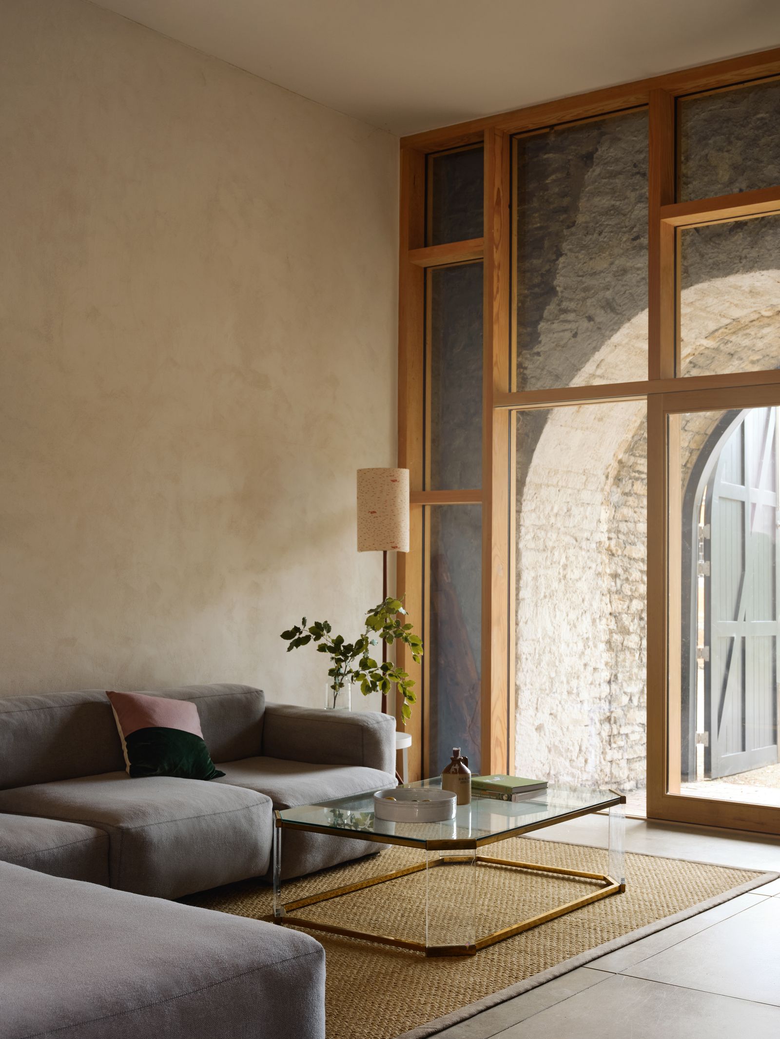 Image may contain Coffee Table Furniture Table Architecture Building Indoors Living Room Room and Interior Design