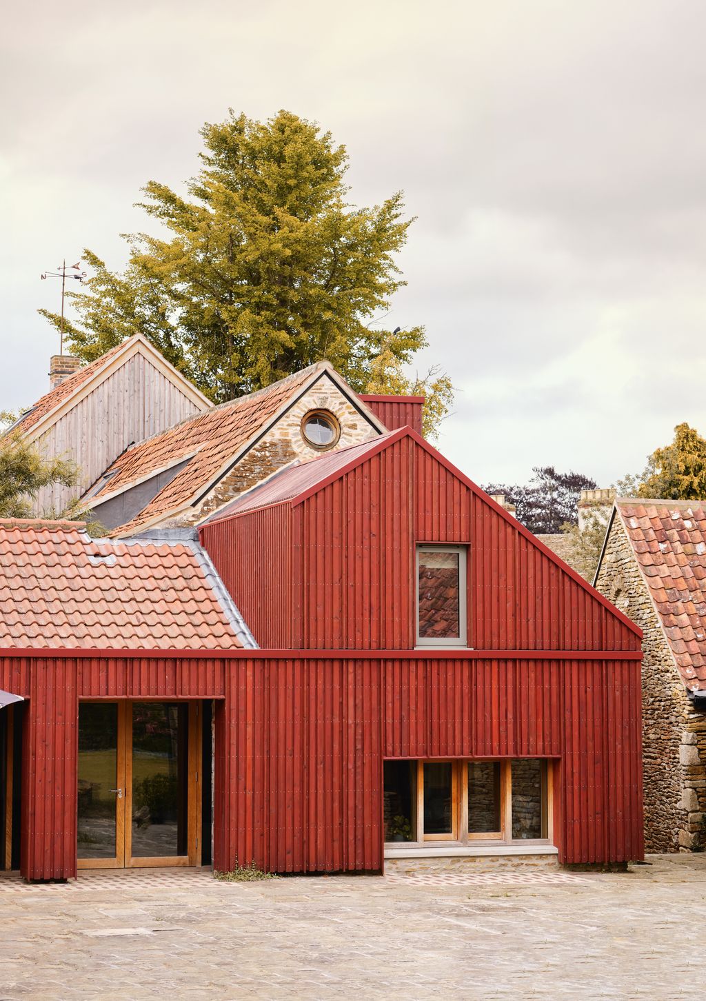 Image may contain Nature Outdoors Countryside Architecture Barn Building Farm Rural Housing and Shelter