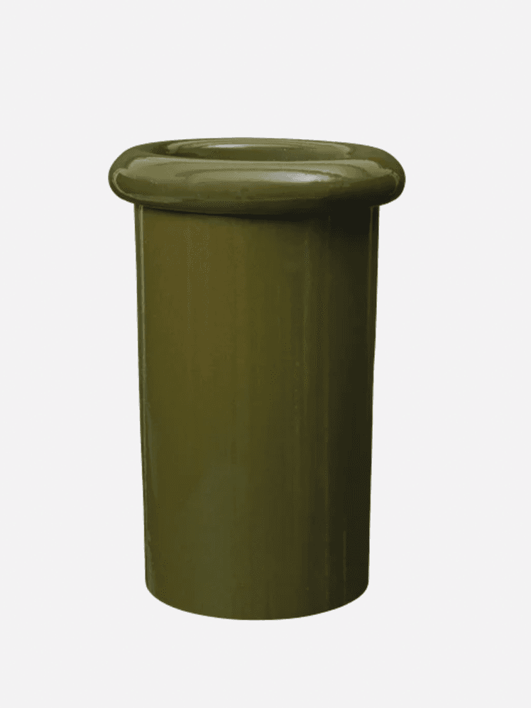 Image may contain: Jar, Cylinder, Furniture, Pottery, Bottle, and Shaker