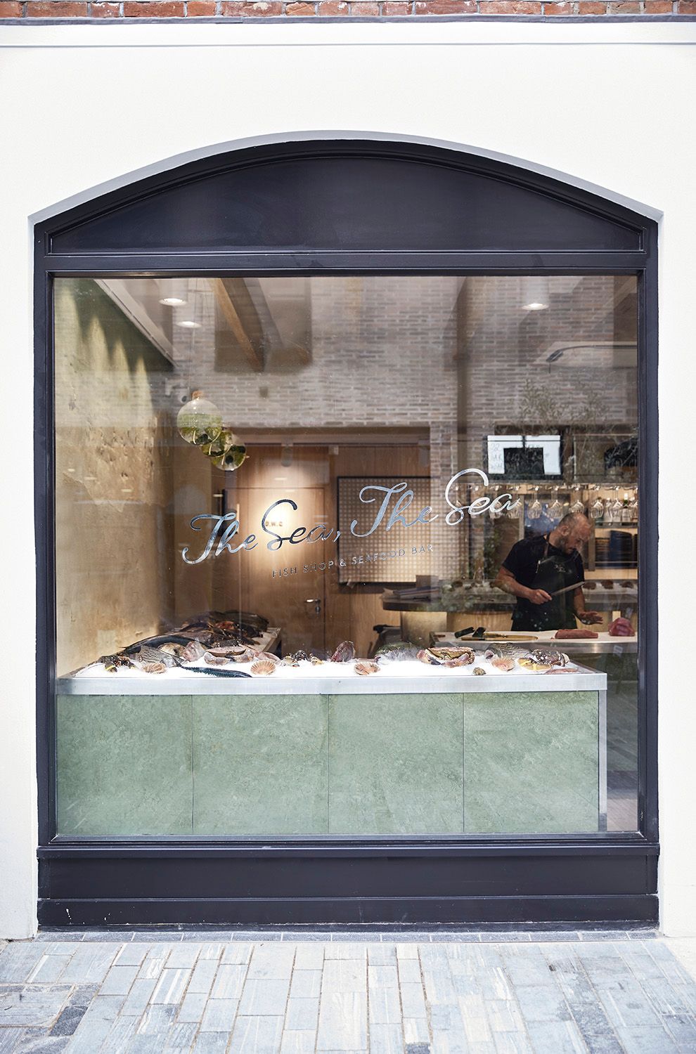 Image may contain Shop Adult Person and Jewelry Store