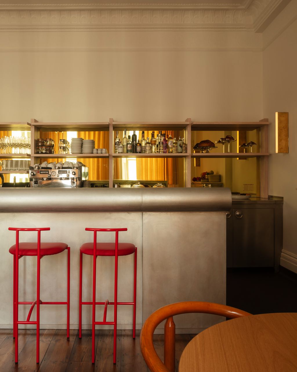 Image may contain Chair Furniture Desk Table and Bar