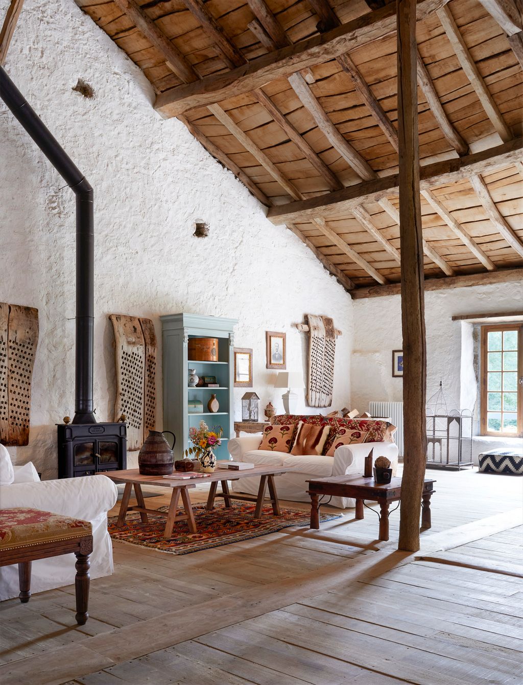 Image may contain Indoors Interior Design Home Decor Art Painting Couch Furniture Architecture and Building