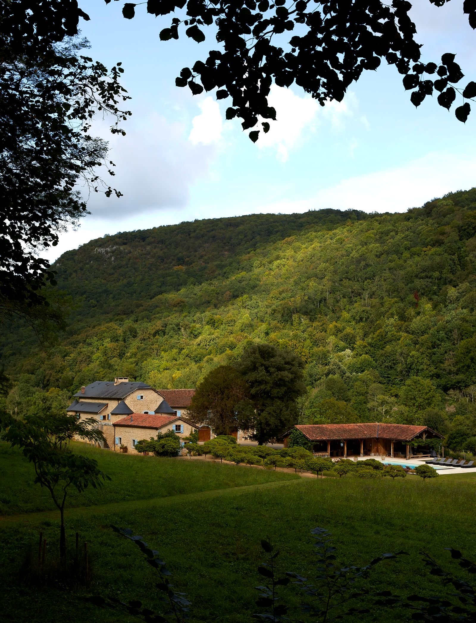 Image may contain Architecture Building Outdoors Shelter Plant Vegetation Tree Grass Nature Scenery and Landscape