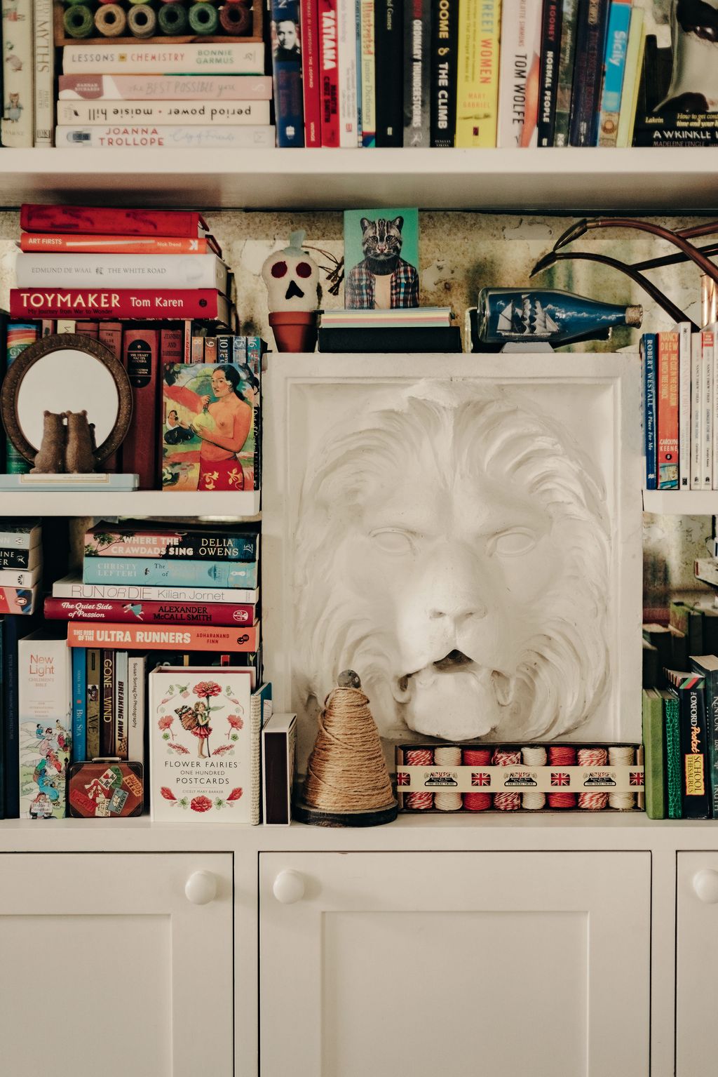 Image may contain Rosalind Russell Furniture Shelf Bookcase Adult Person Wedding and Plate