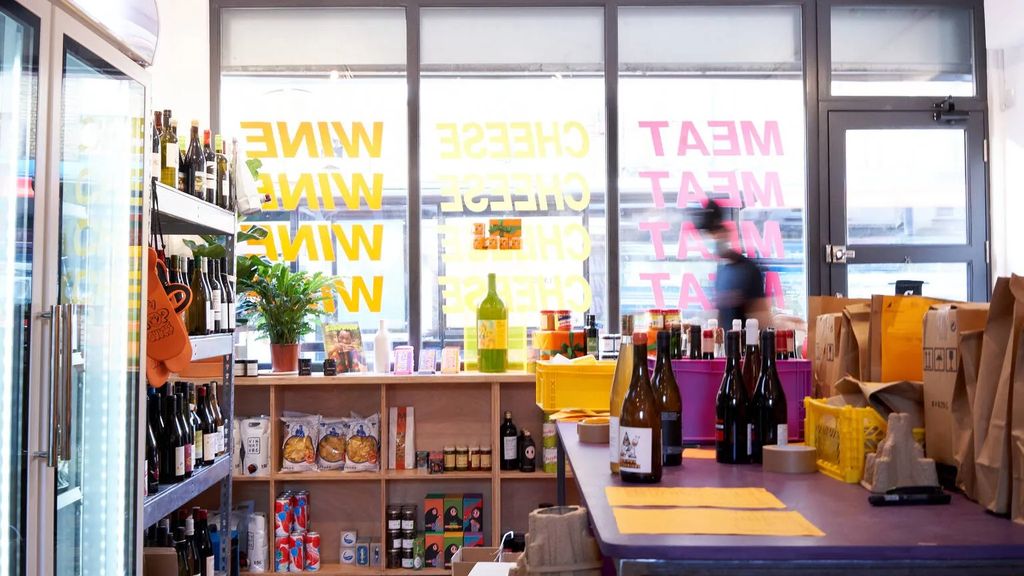 Image may contain Plant Person Shop Desk Furniture Table Indoors Alcohol Beverage and Liquor