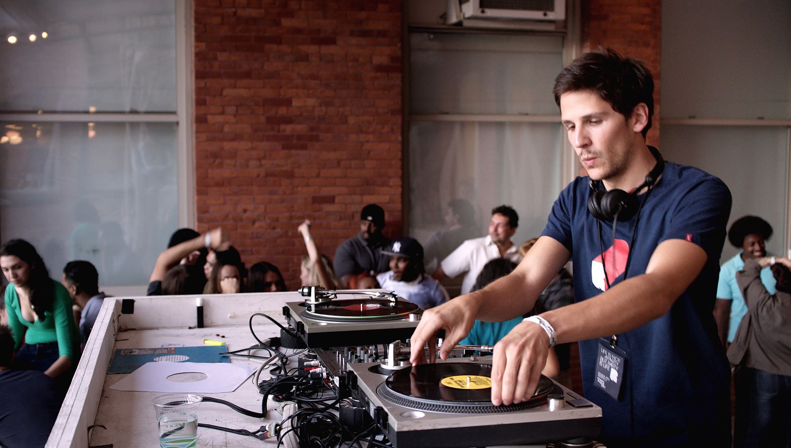 Image may contain Daniel Booko Electronics Headphones Cup Person Teen Clothing Hat Adult Accessories and Bracelet