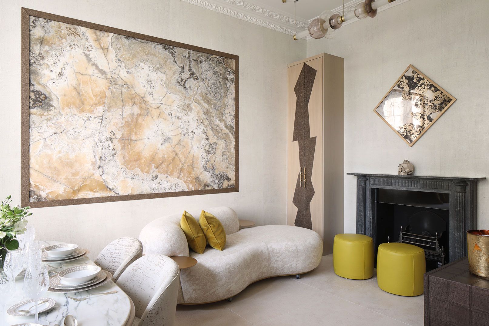 Image may contain: Indoors, Interior Design, Home Decor, Plate, Furniture, Fireplace, Art, Painting, and Architecture