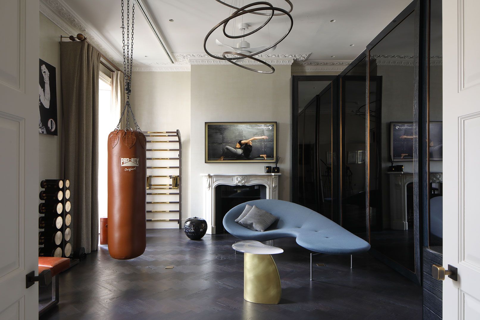 Image may contain: Architecture, Building, Furniture, Indoors, Living Room, Room, Floor, Flooring, Home Decor, and Art