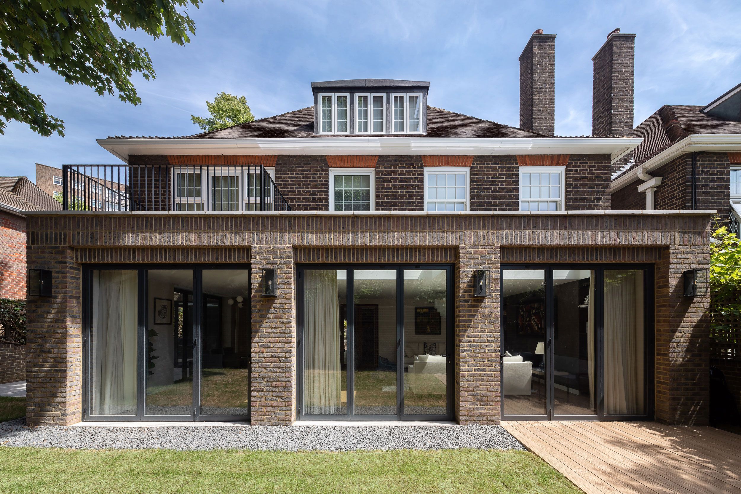 Image may contain: Door, Art, Painting, Architecture, Building, Housing, Indoors, House, Grass, Plant, Couch, and Furniture