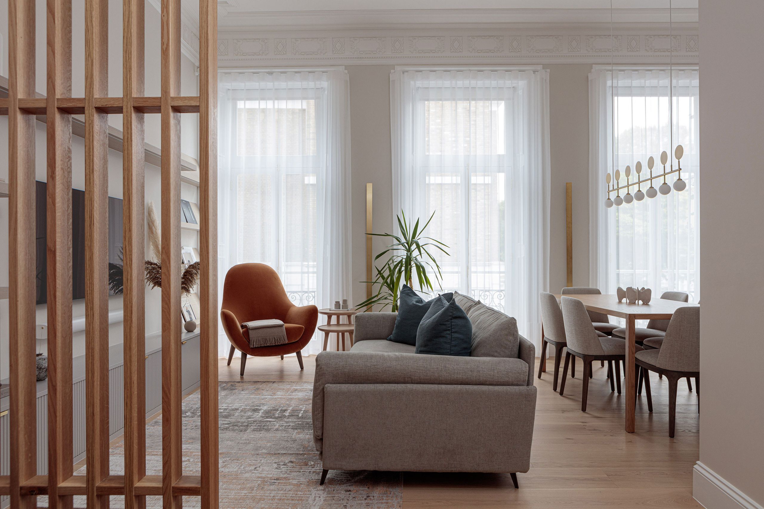 Image may contain: Indoors, Interior Design, Couch, Furniture, Chair, Architecture, Building, Living Room, Room, and Table