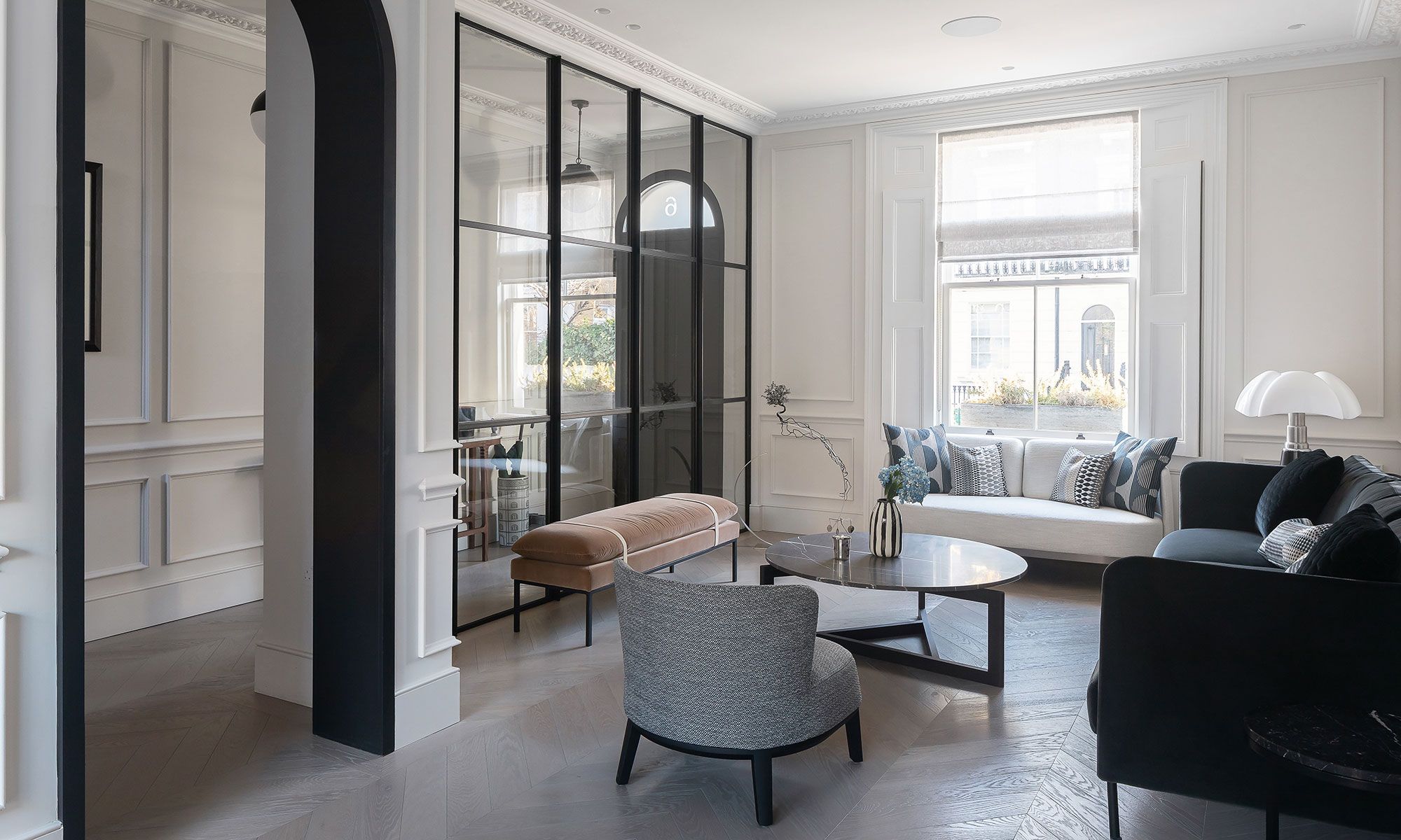 Image may contain: Door, Chair, Furniture, Architecture, Building, Indoors, Living Room, Room, Interior Design, and Couch