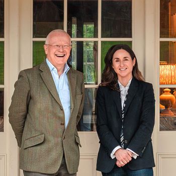 Image may contain: Blazer, Clothing, Coat, Jacket, Adult, Person, Accessories, Glasses, Formal Wear, Suit, Head, and Face