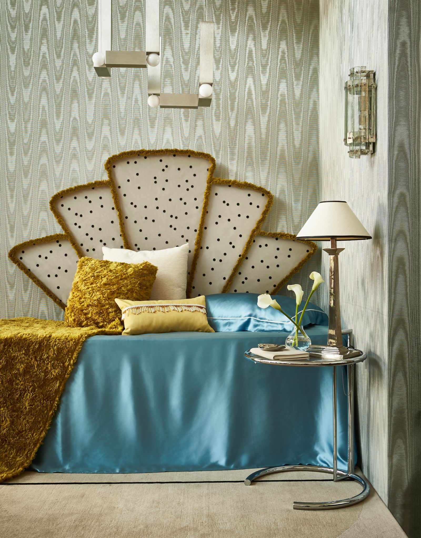 Image may contain Indoors Interior Design Lamp Cushion Home Decor Furniture Bed Bedroom and Room