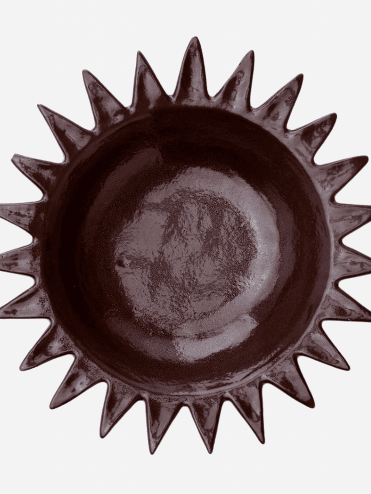 Image may contain Pottery Ammunition Grenade and Weapon