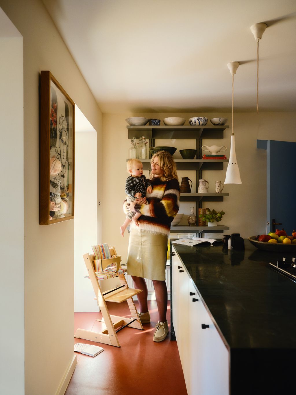 Image may contain Face Head Person Photography Portrait Architecture Building Dining Room and Dining Table