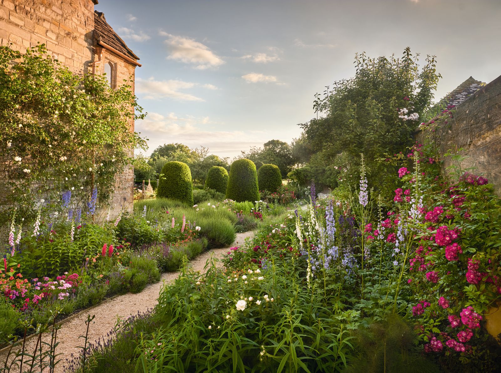 Image may contain Garden Nature Outdoors Grass Park Plant Architecture Building Cottage House Housing and Herbal