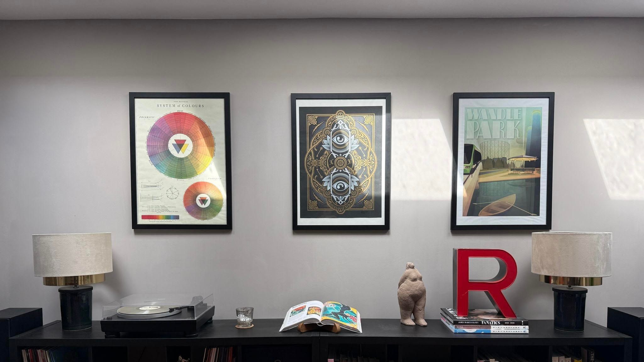 Image may contain: Book, Publication, Lamp, Cup, Art, Painting, Furniture, Bookcase, Animal, Bear, Mammal, and Wildlife