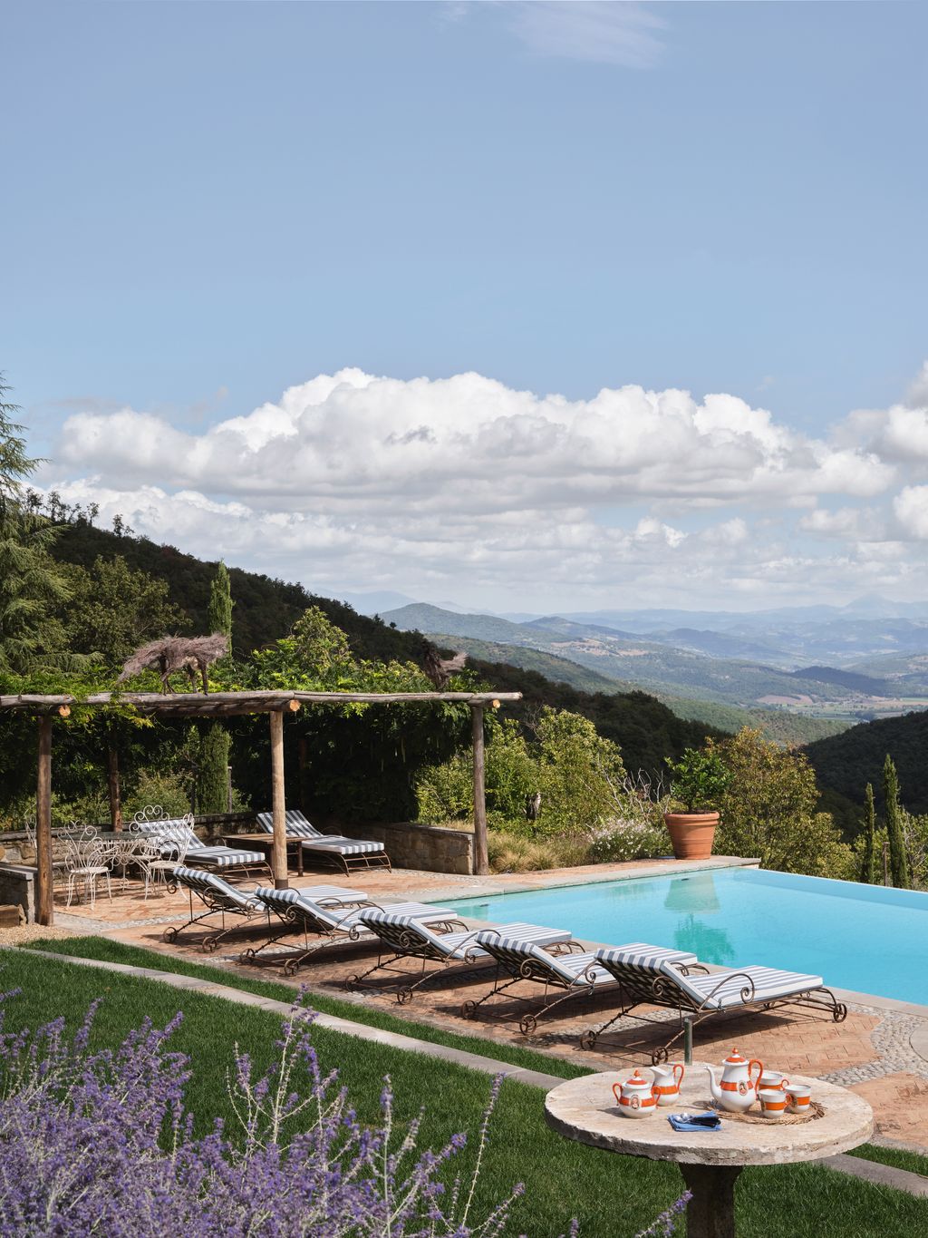 Image may contain Architecture Building House Housing Villa Hotel Plant Resort Desk Furniture Table and Chair