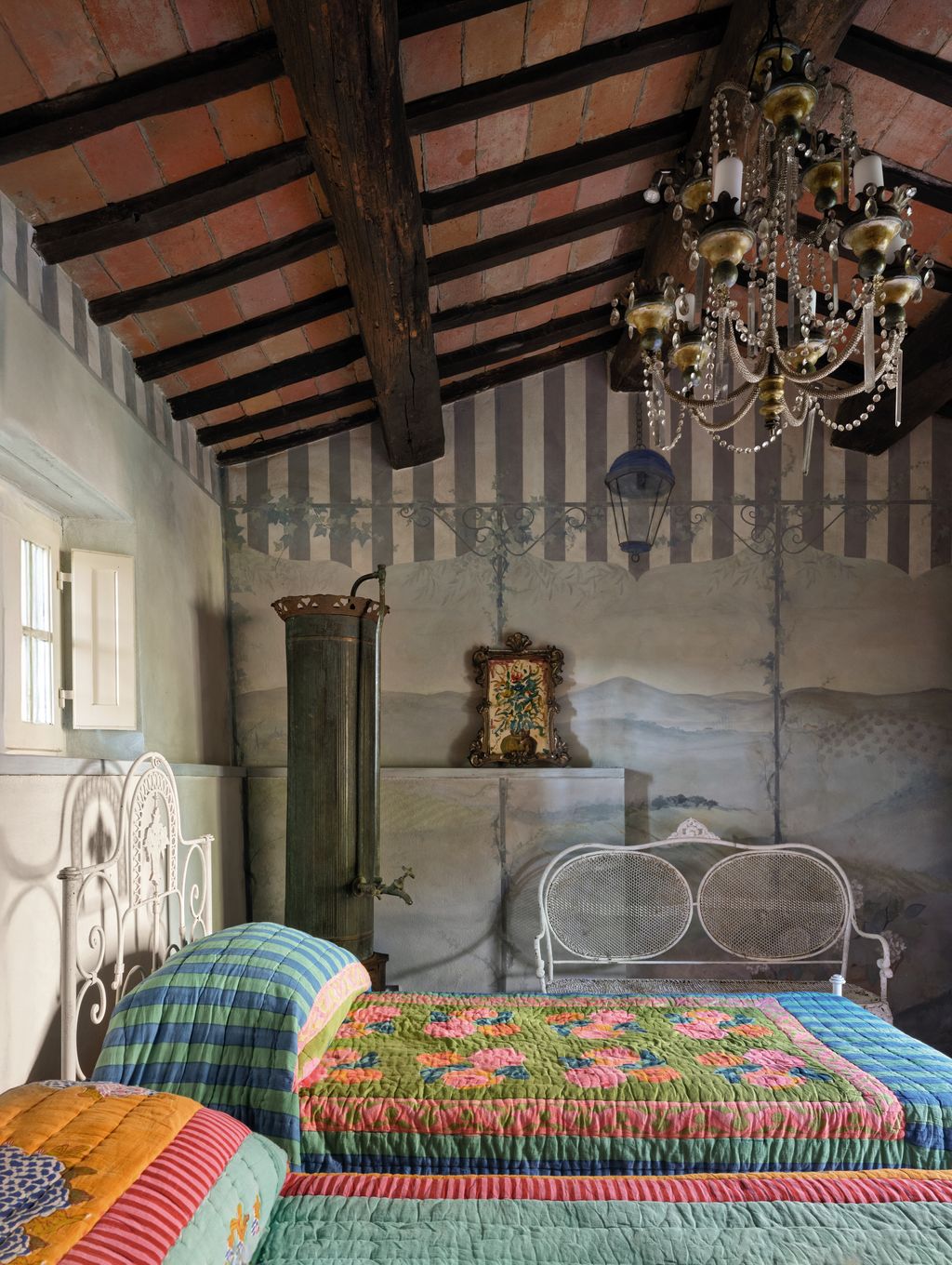 Image may contain Chandelier Lamp Indoors Interior Design Home Decor Bed Furniture Art Painting Bedroom and Room