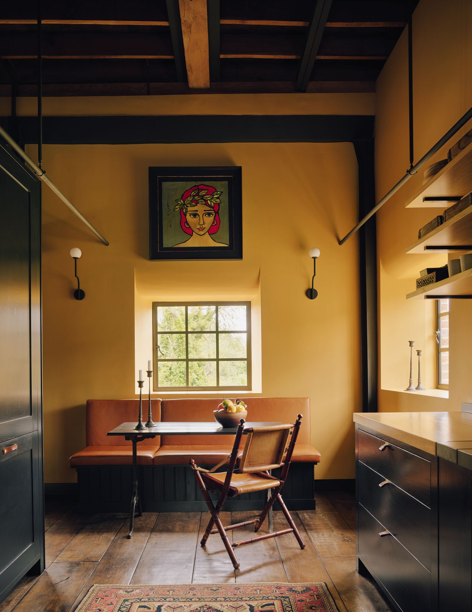 Image may contain Corner Indoors Interior Design Furniture Table Chair Home Decor Rug Art Painting Lamp and Floor