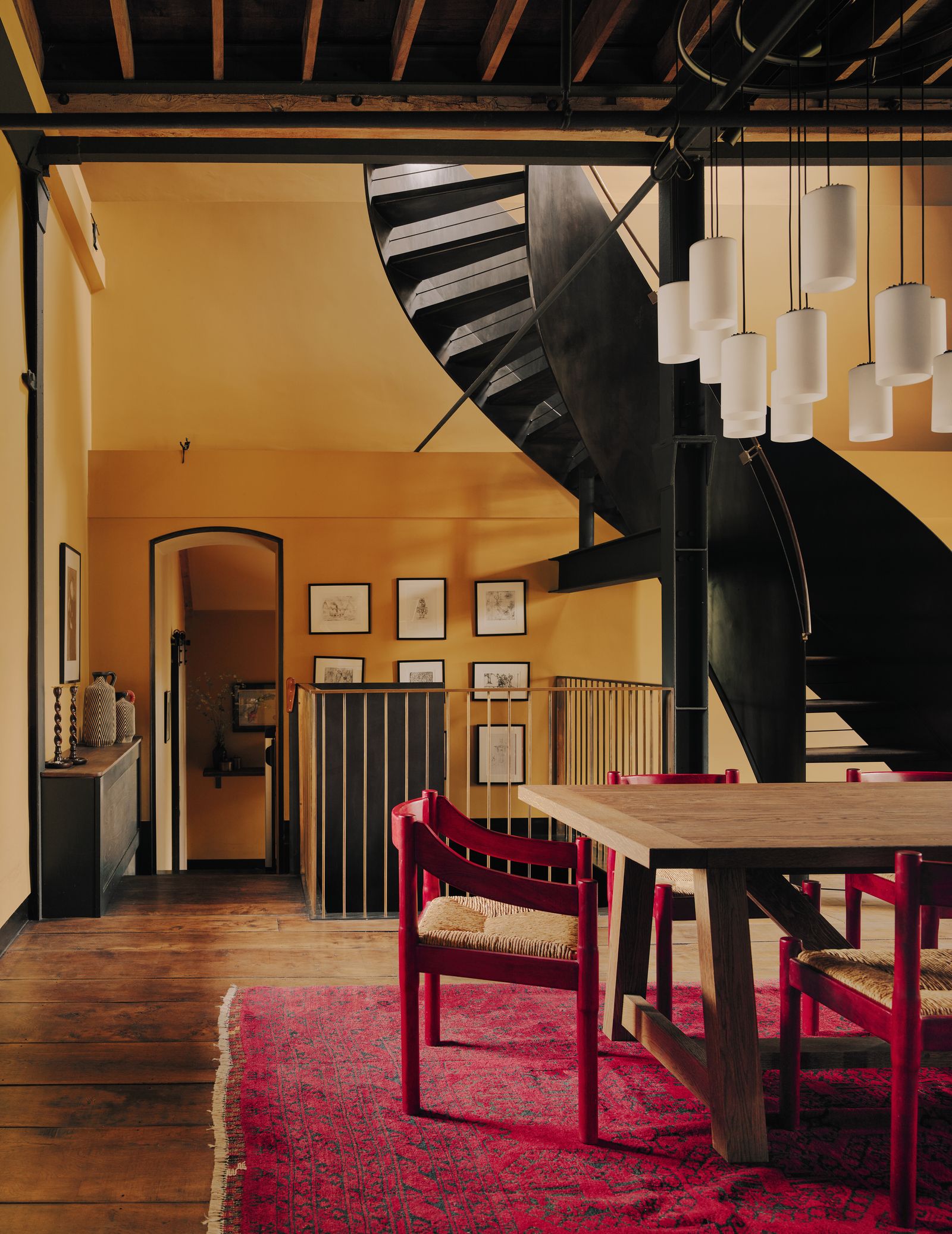 Image may contain Indoors Interior Design Home Decor Architecture Building Dining Room Dining Table and Furniture