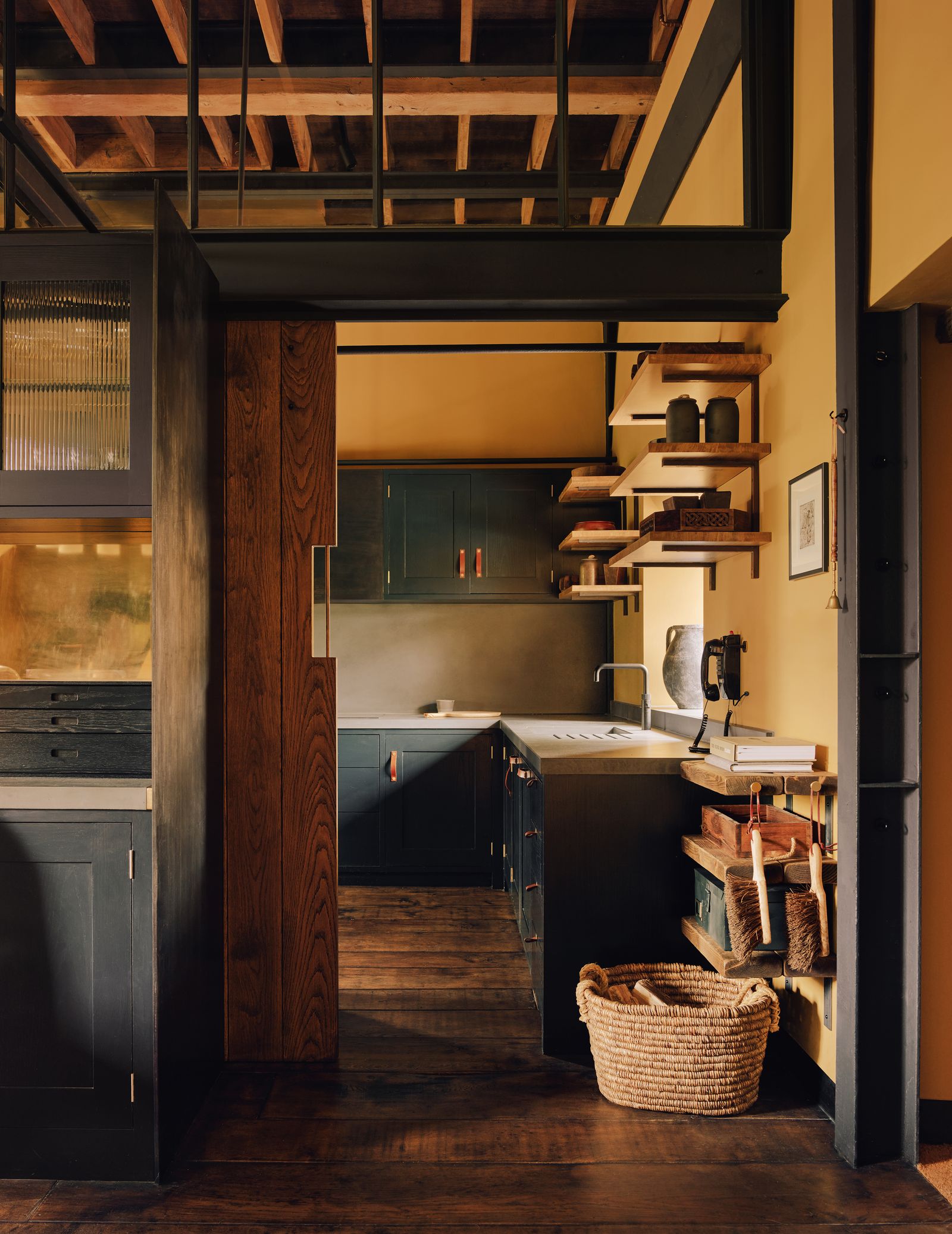 Image may contain Indoors Interior Design Floor Sink Sink Faucet Art Painting Wood Architecture Building and House