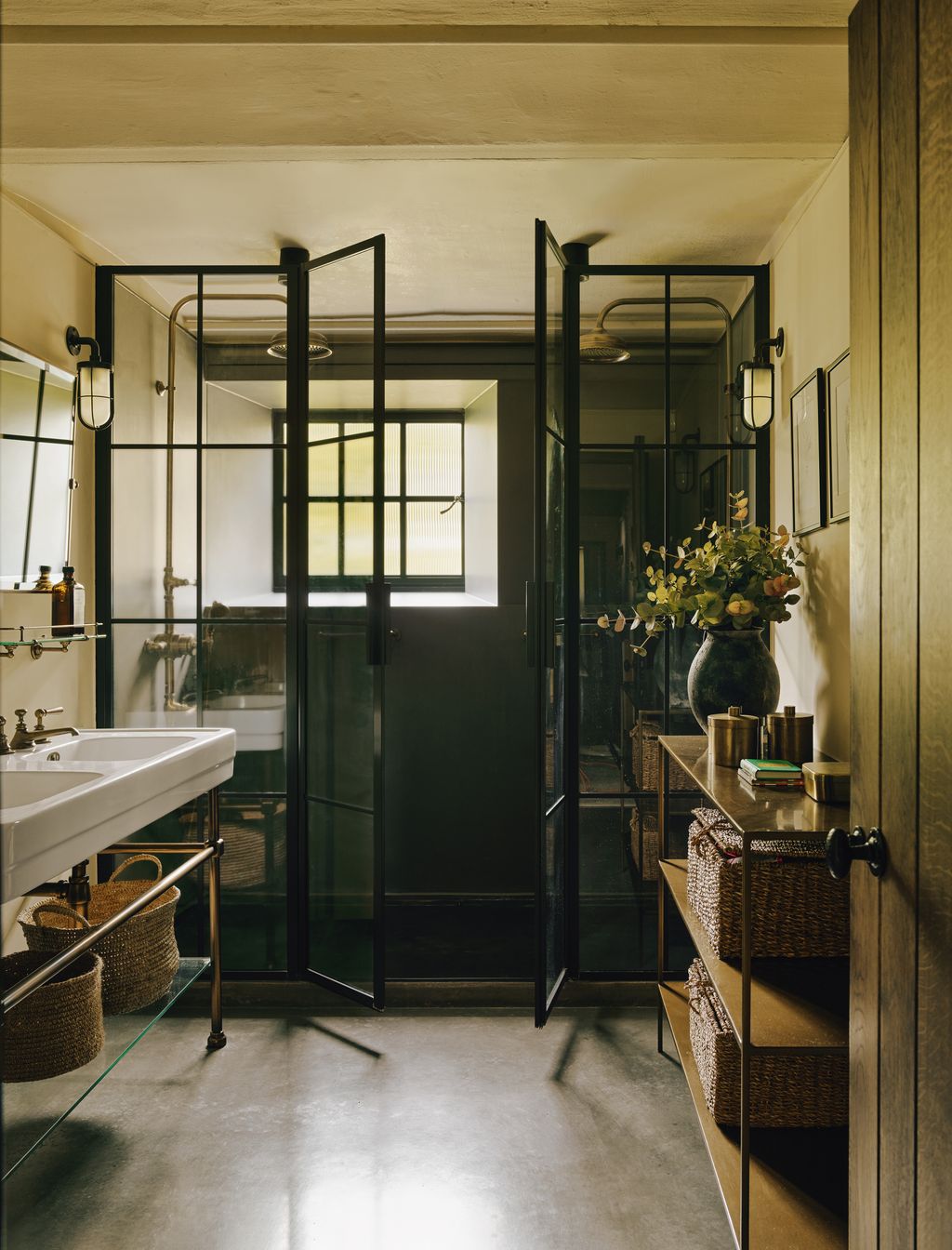 Image may contain Door Lamp Sink Architecture Building Housing Indoors Interior Design Bathing House and Art