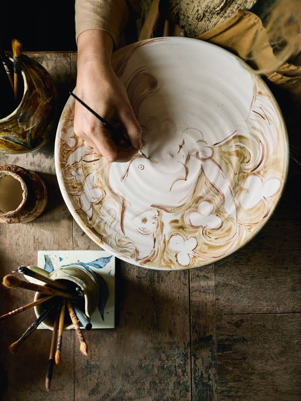 Image may contain Art Food Food Presentation Handicraft Meal Person Plate and Dish