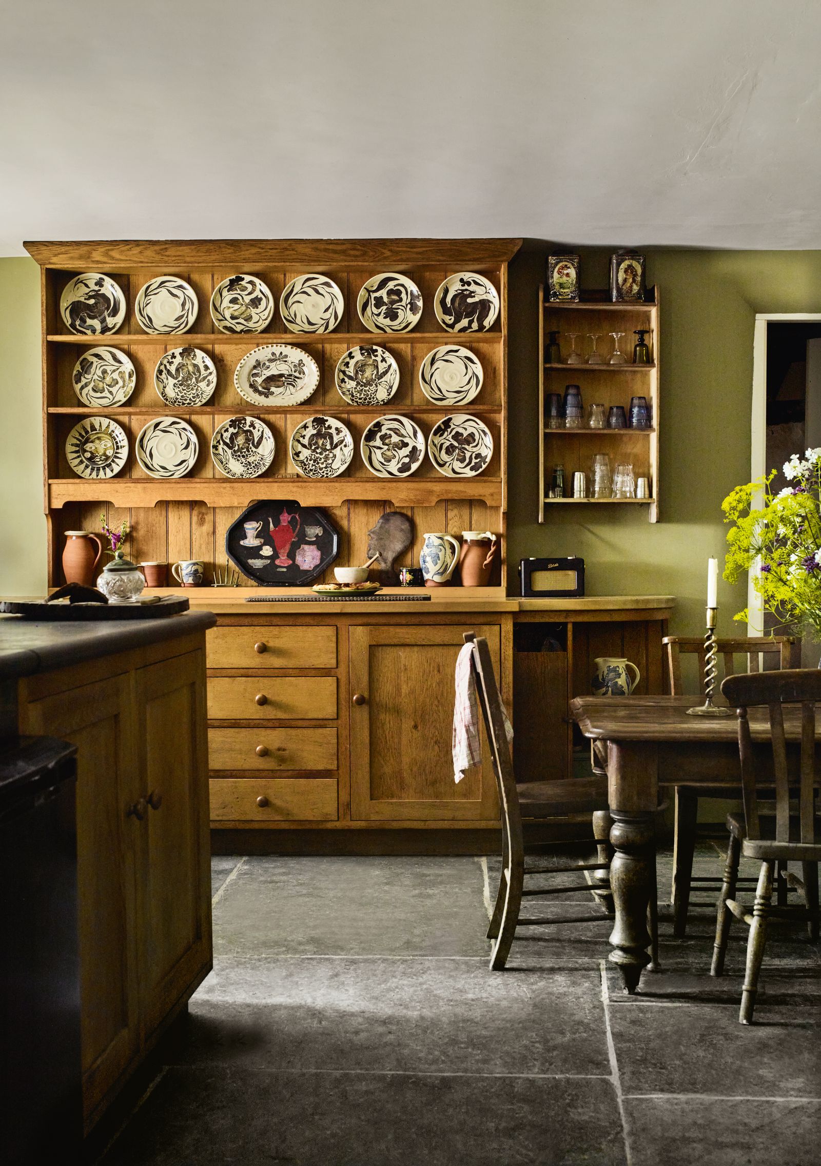 Image may contain Indoors Interior Design Architecture Building Dining Room Dining Table Furniture Room and Table