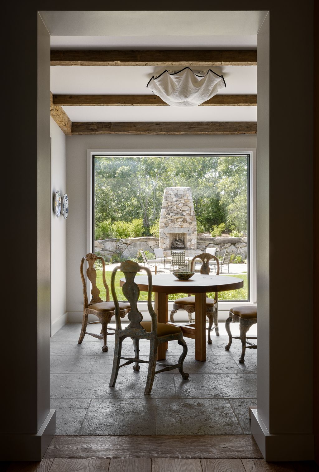 Image may contain Architecture Building Dining Room Dining Table Furniture Indoors Room Table Chair and Floor