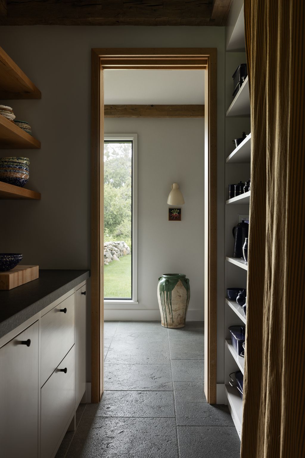 Image may contain Indoors Interior Design Lamp Furniture Floor Box Room and WalkIn Closet