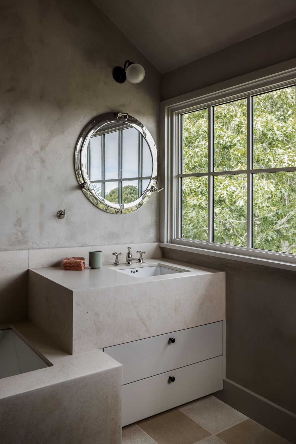 Image may contain Lamp Sink Sink Faucet Window and Cup