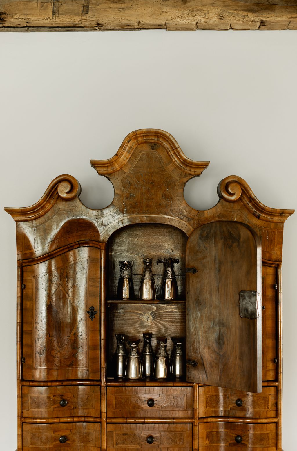 Image may contain Cabinet Furniture Sideboard Closet Cupboard Wood and Person