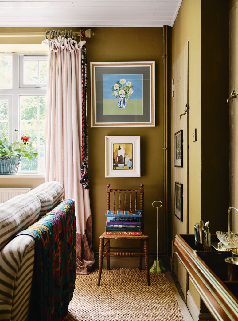 Image may contain: Architecture, Building, Furniture, Indoors, Living Room, Room, Art, Painting, Couch, Chair, and Home Decor