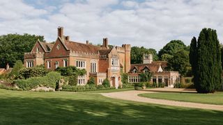 Image may contain Architecture Building Housing House Manor and Plant