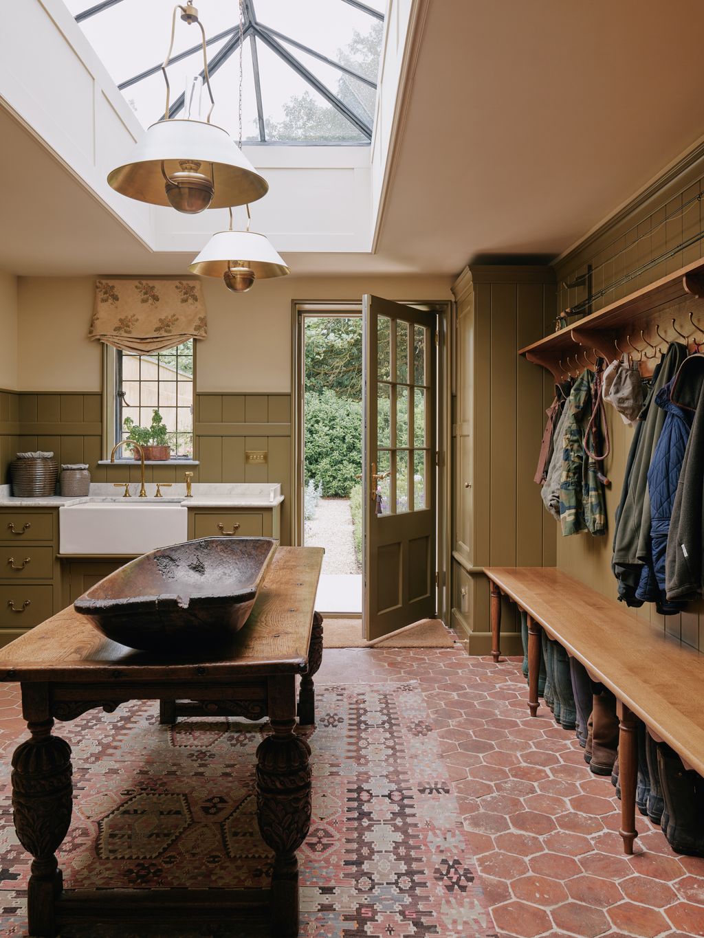 Image may contain Lamp Floor Plant Sink Desk Furniture Table Indoors Interior Design Sink Faucet and Window