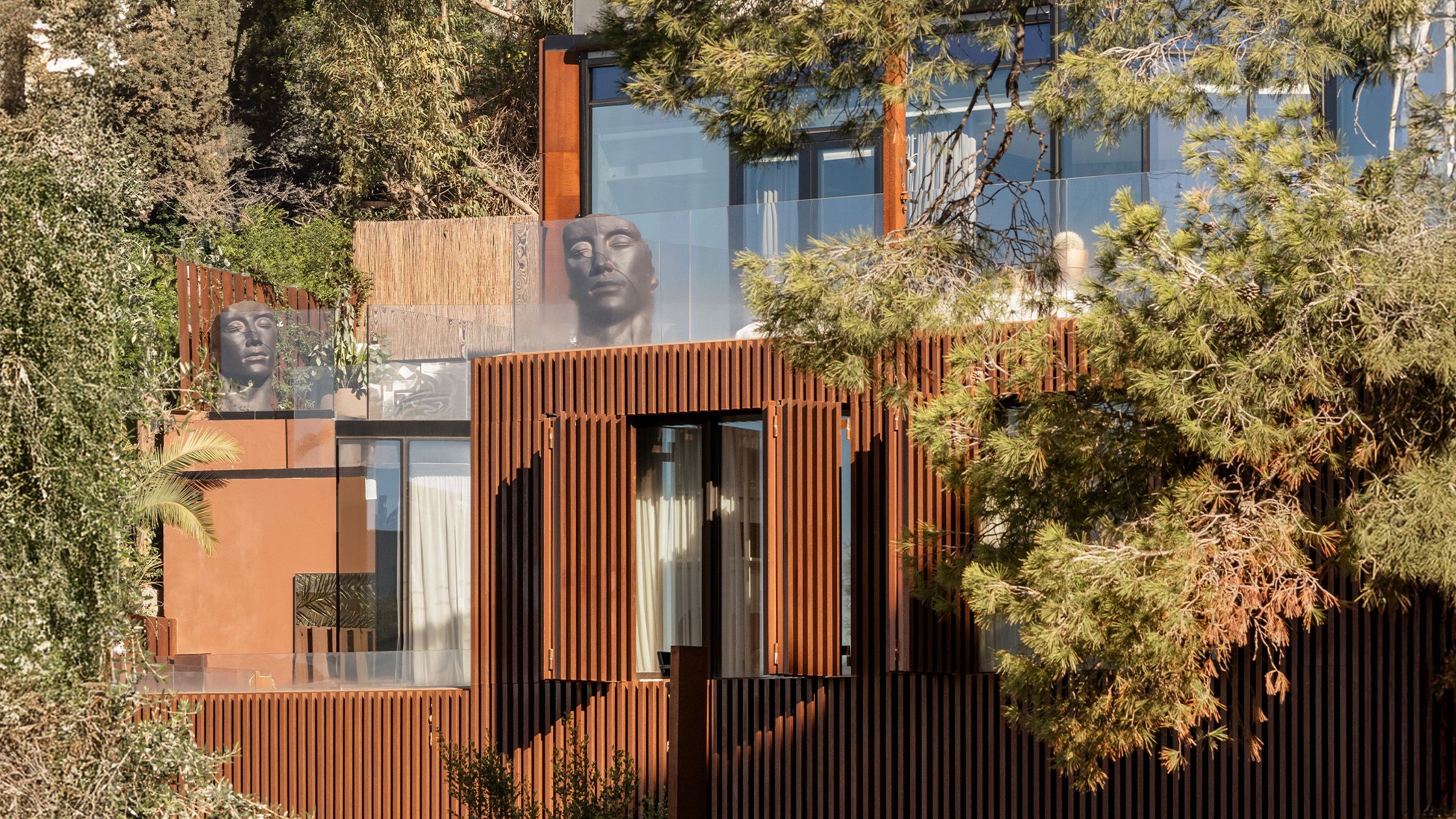 Image may contain: Senusret III, Indoors, Interior Design, Person, and Wood Panels