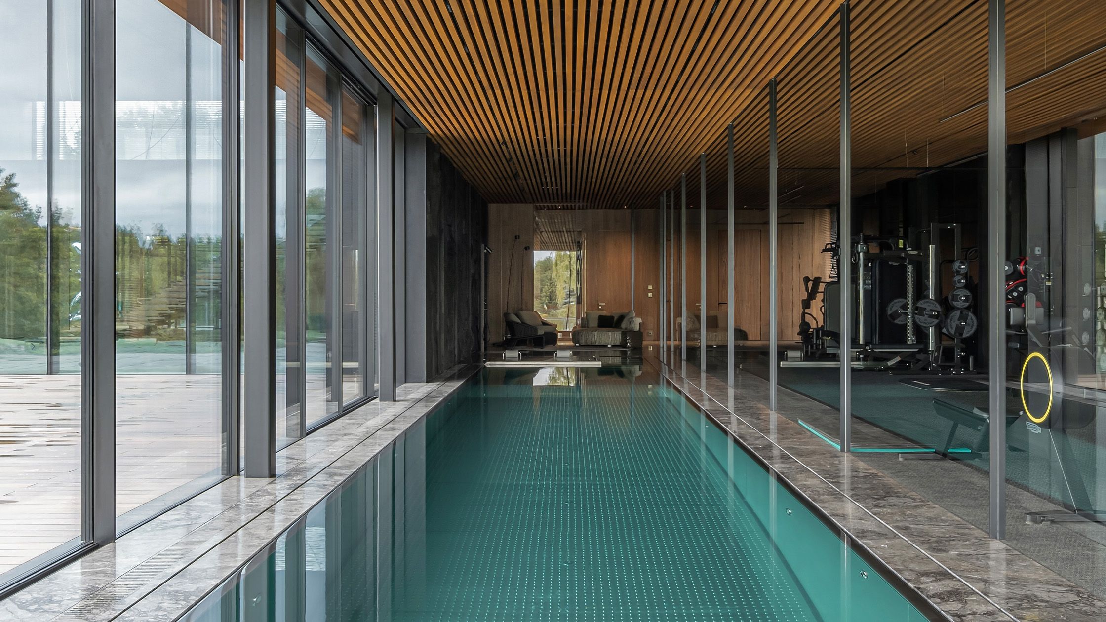 Image may contain: Indoors, Interior Design, Pool, Water, Swimming Pool, and Floor