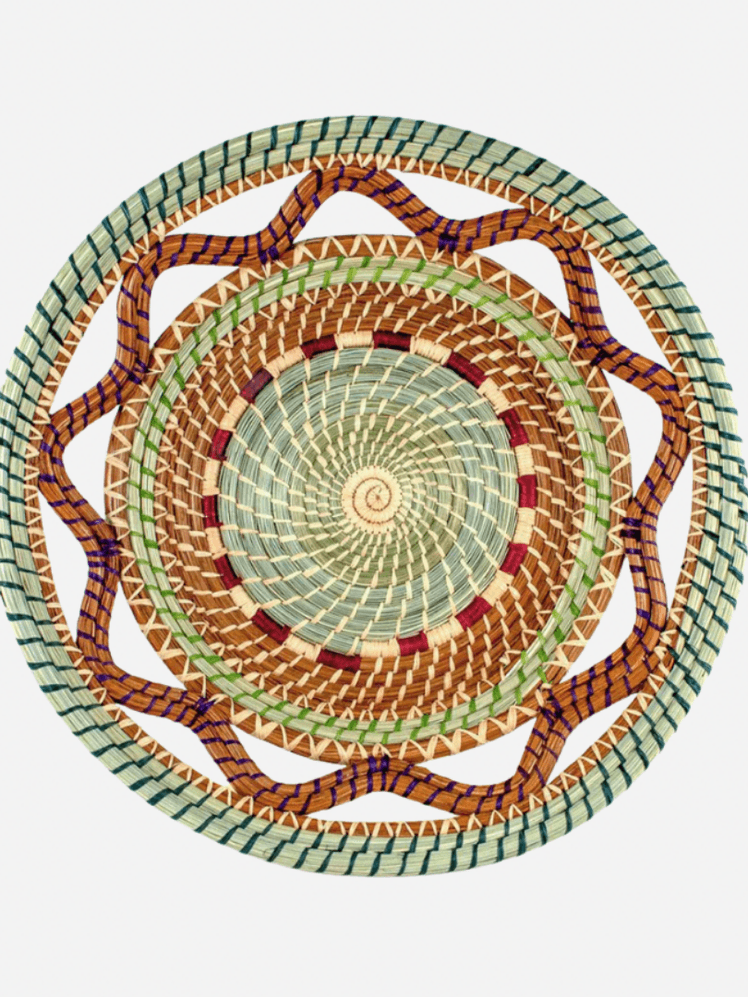 Image may contain: Home Decor, Woven, Animal, Reptile, Snake, Person, Weaving, Rug, Art, and Handicraft