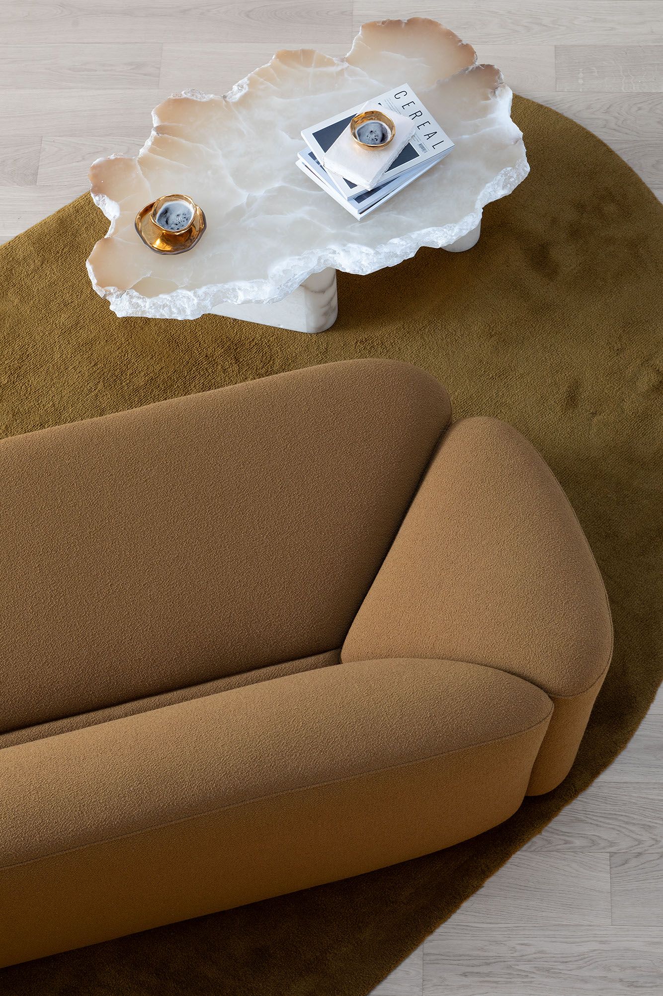 Image may contain: Couch, Furniture, Home Decor, and Table