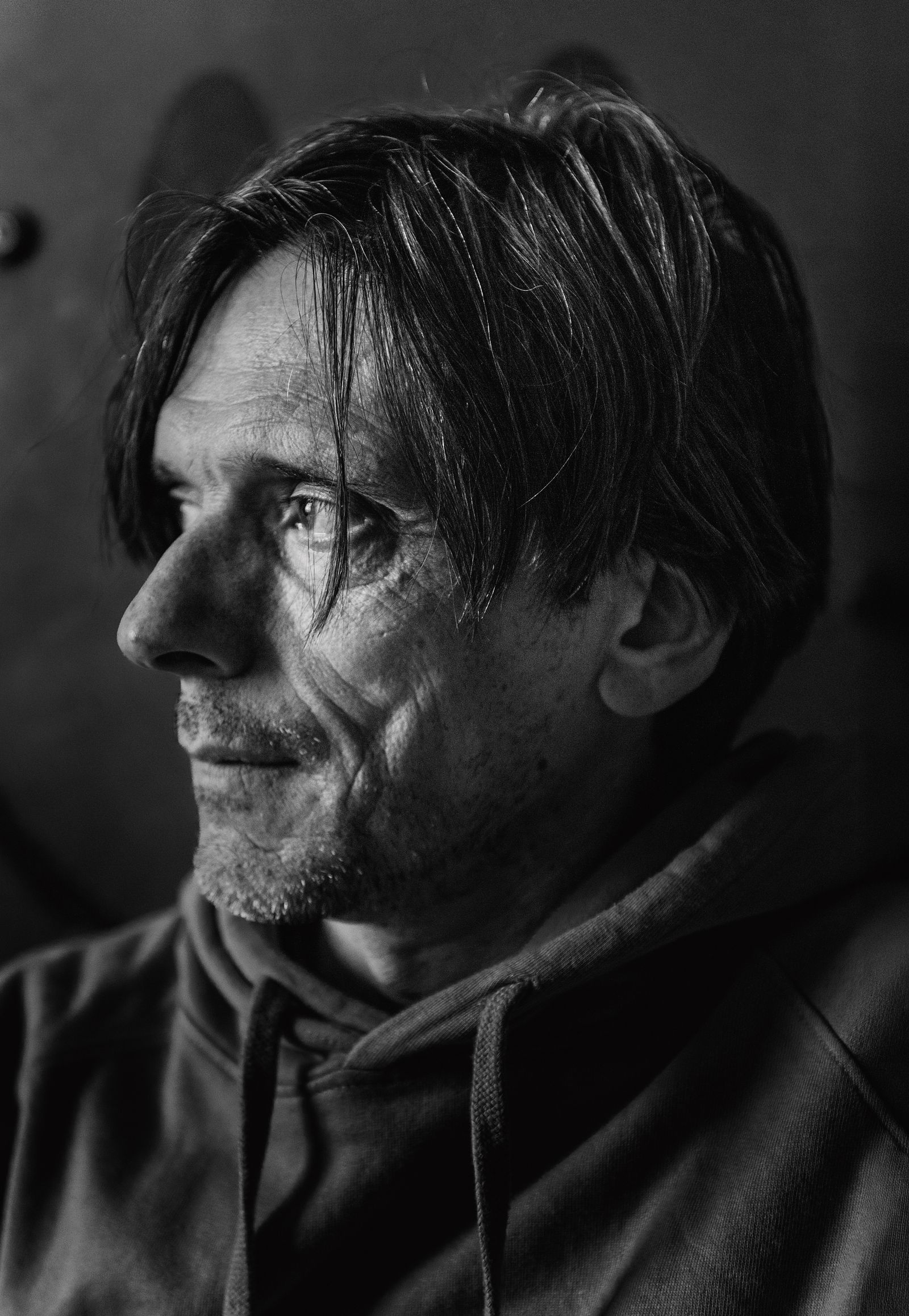 Image may contain Face Head Person Photography Portrait Happy Smile Adult Body Part and Neck