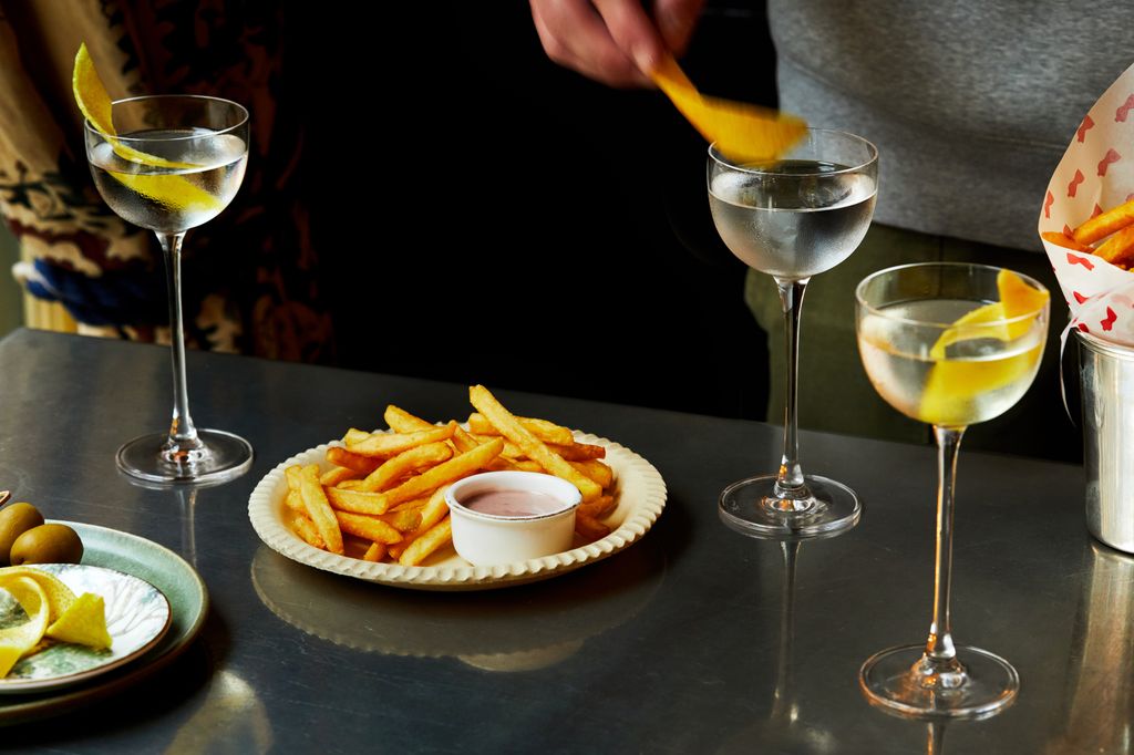 Image may contain Food Food Presentation Brunch Plate Person Alcohol Beverage Cocktail and Glass