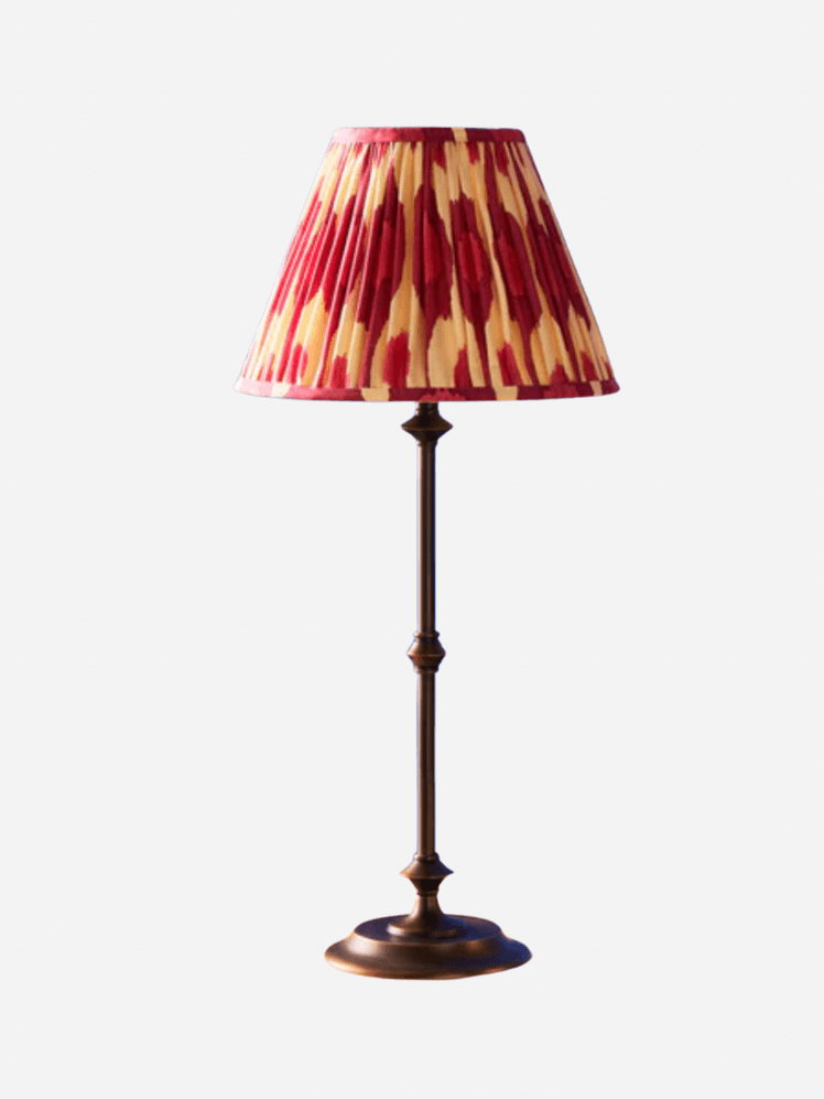 Image may contain: Lamp, Lampshade, and Table Lamp