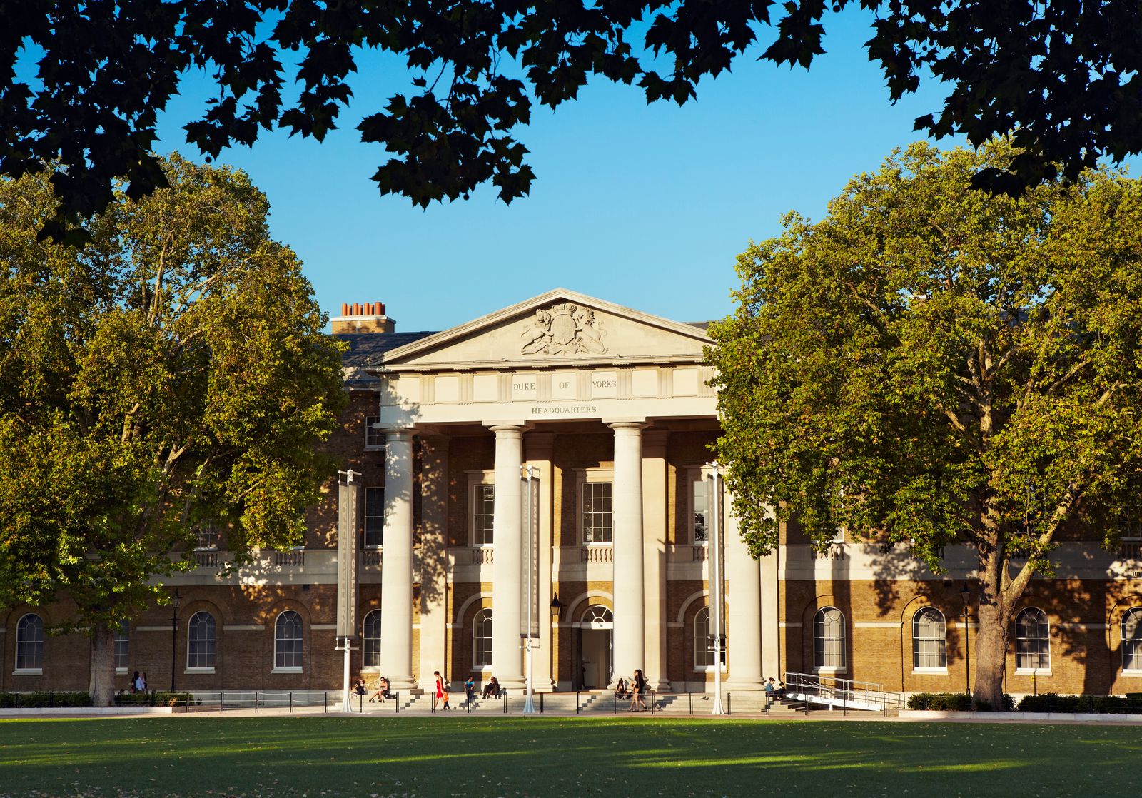 Image may contain Architecture Building Housing House Portico and Person