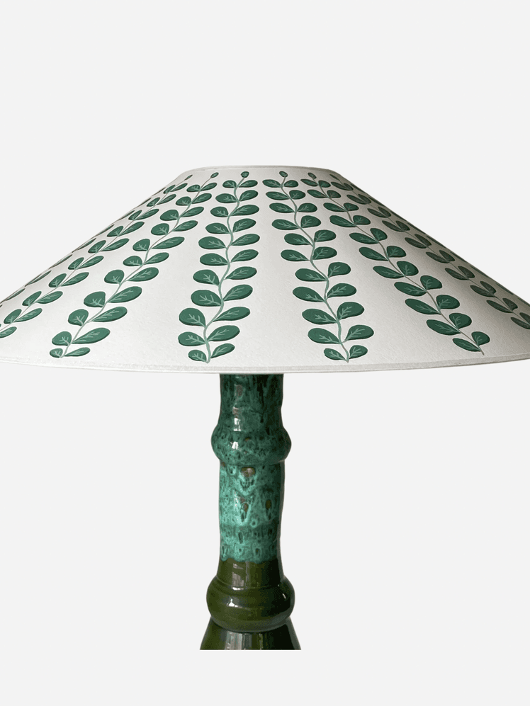 Image may contain: Lamp, Lampshade, and Table Lamp