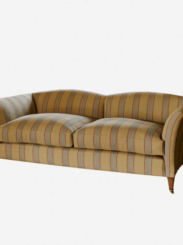 Image may contain: Couch, Furniture, Cushion, and Home Decor