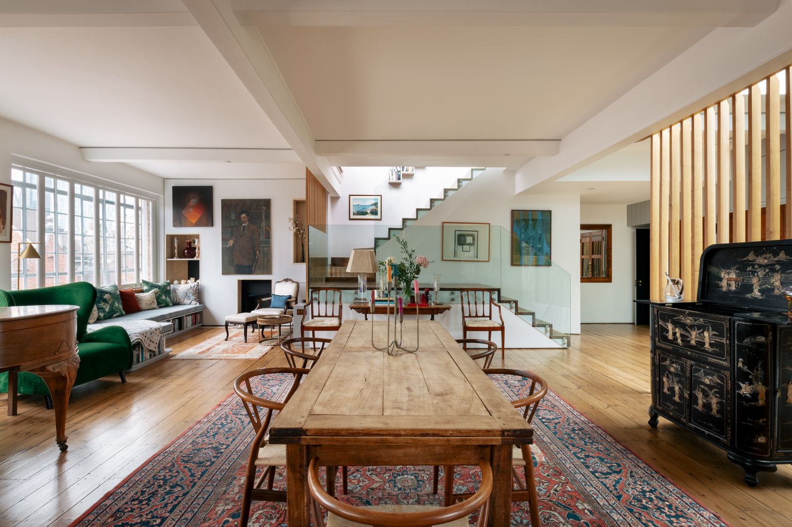 Image may contain Home Decor Furniture Table Architecture Building Dining Room Dining Table Indoors and Room