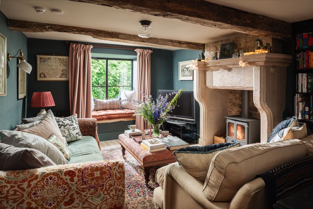 Image may contain Lamp Home Decor Architecture Building Furniture Indoors Living Room Room Book and Publication